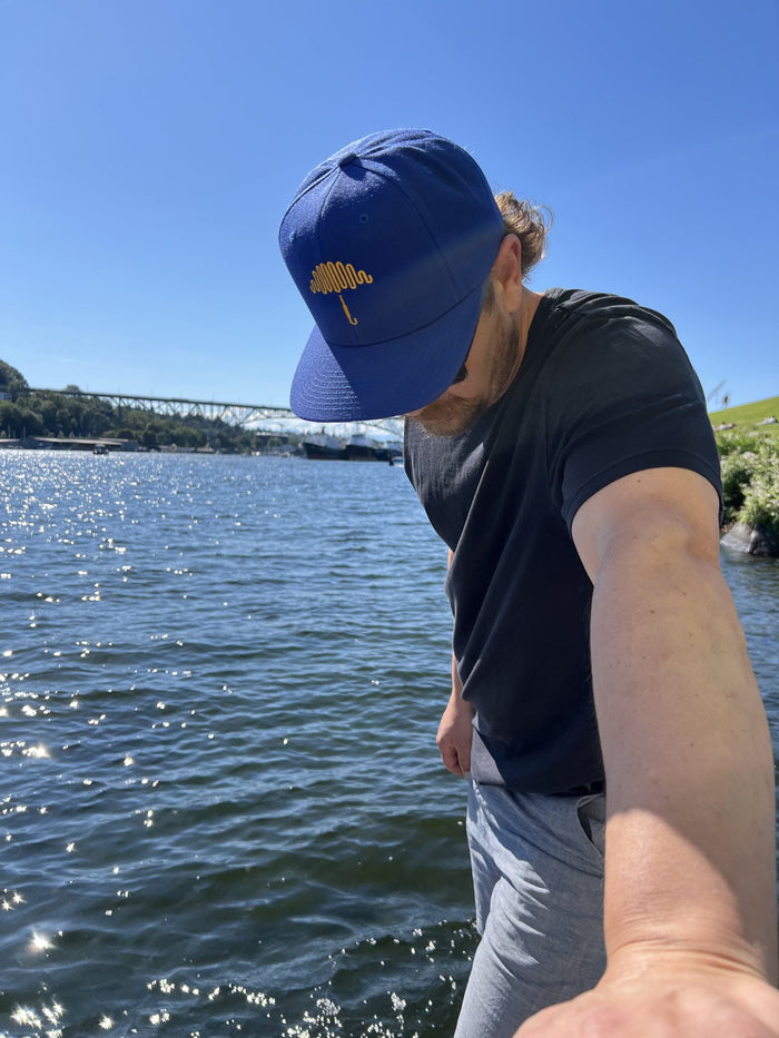Trident Crest Blue Snapback Hat